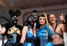 Exploring the World of Advanced Bondage Gear - Complete Guide 1 Group of people in bondage gear and latex costumes posing at an event.